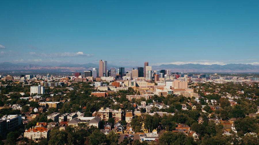 Downtown Denver with the Front Range on the horizon behind it.